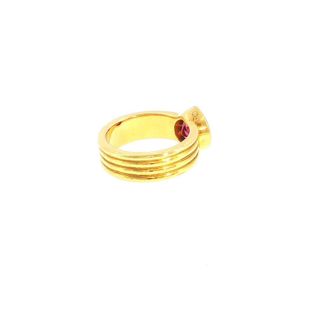 Solitaire Ring with Reddish-Pink Tourmaline in Ribbed Yellow Gold