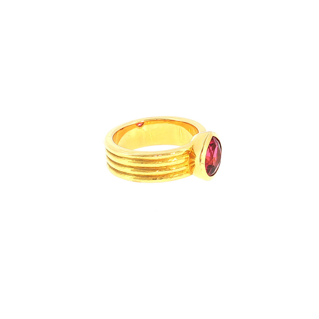Solitaire Ring with Reddish-Pink Tourmaline in Ribbed Yellow Gold