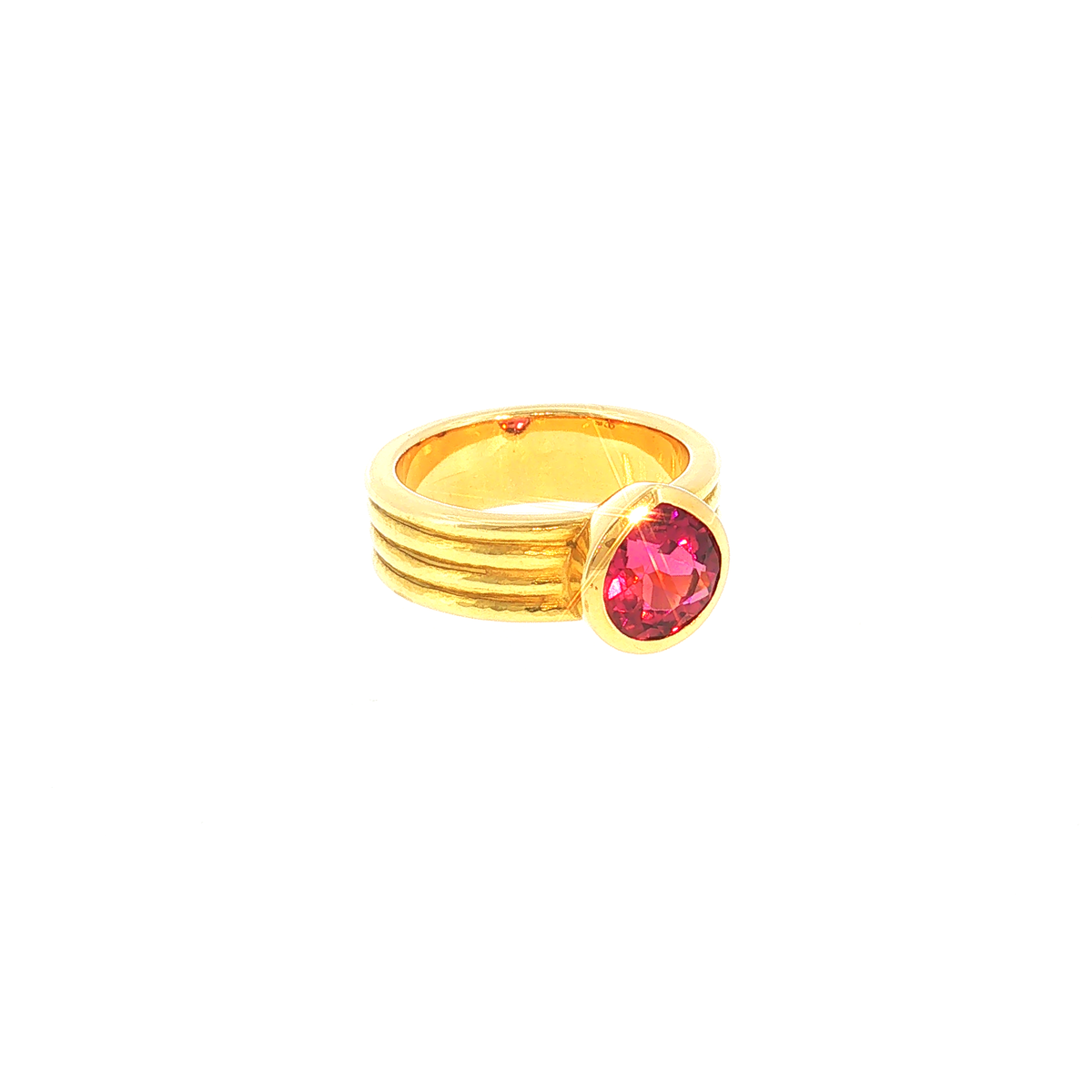 Solitaire Ring with Reddish-Pink Tourmaline in Ribbed Yellow Gold