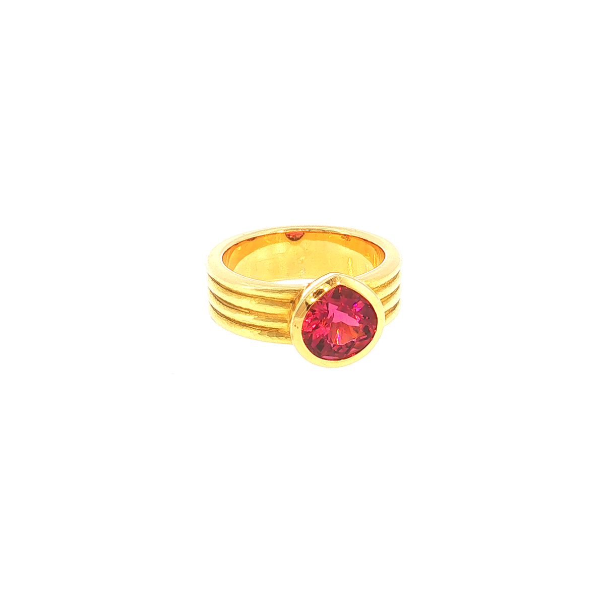 Solitaire Ring with Reddish-Pink Tourmaline in Ribbed Yellow Gold
