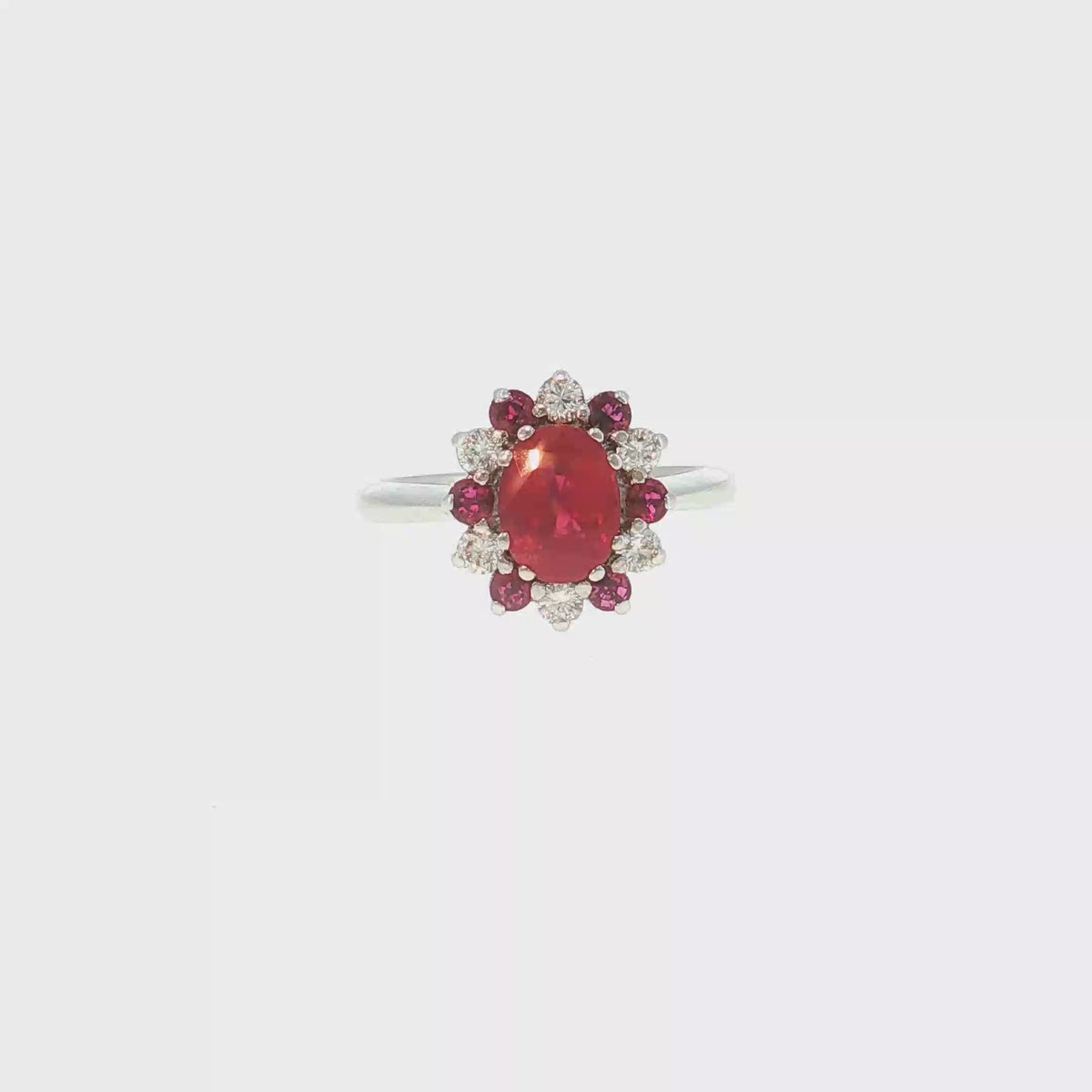 Cocktail Ring in White Gold with Ruby and Diamond Halo